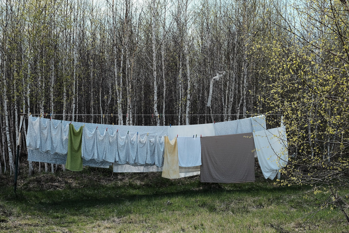 bamboo sheets hanging in fresh air; laundrys tips for organic bamboo sheets