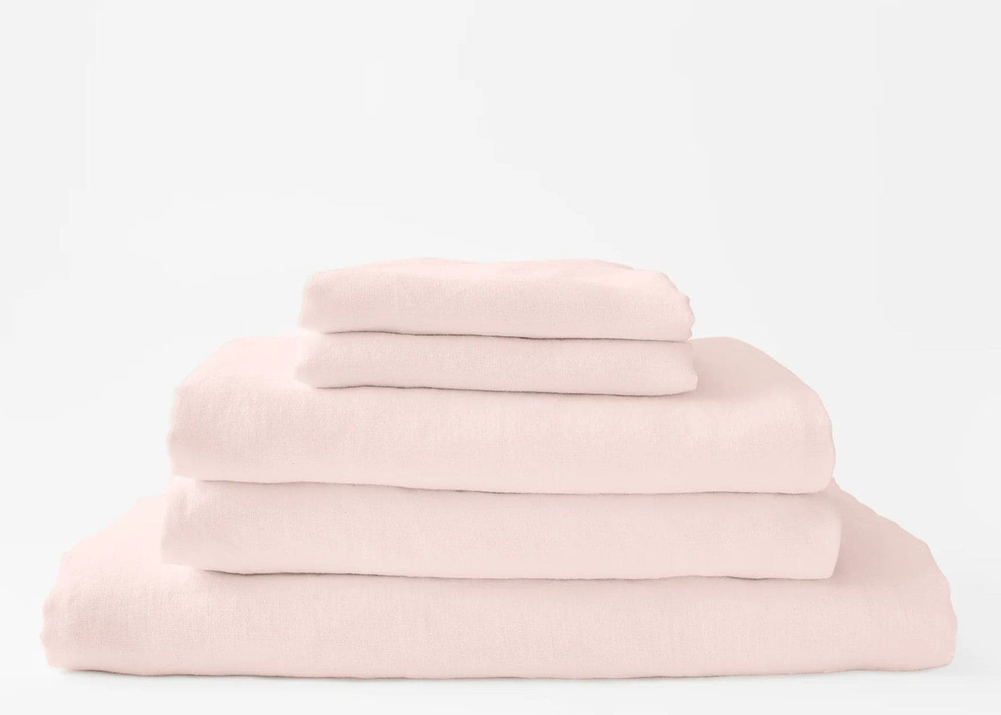 a bundle of hemp sheets in calm morning pale rose color